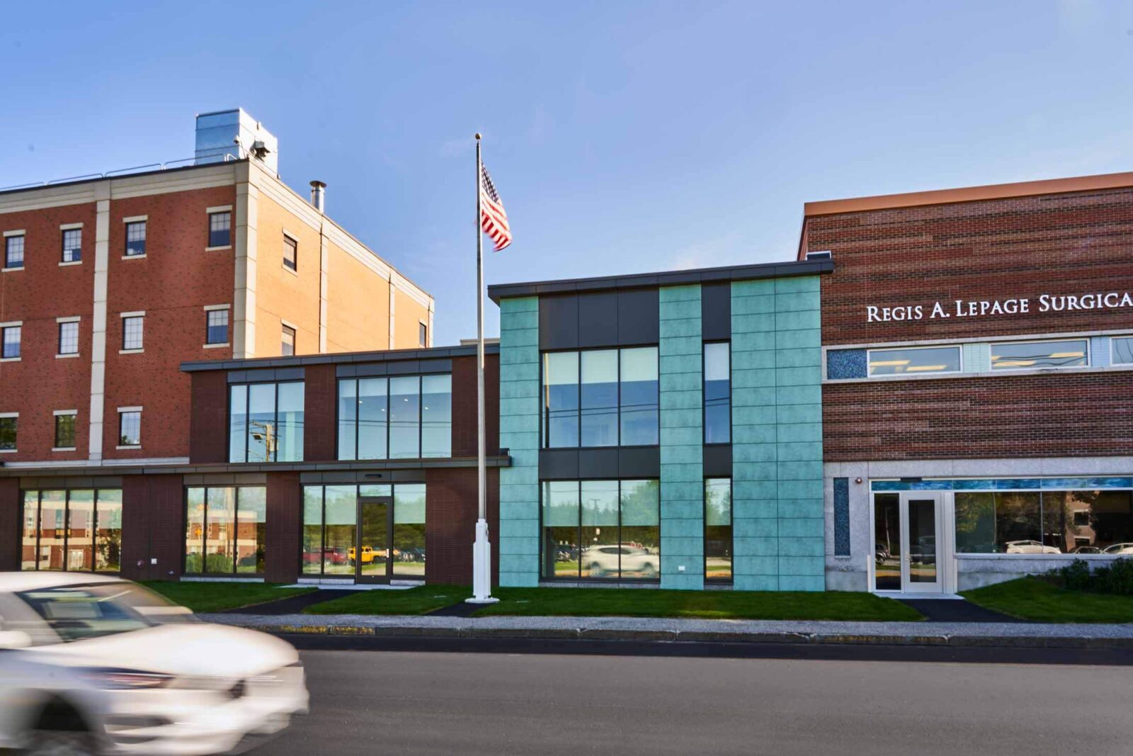 Street view of medical center addition with green brick